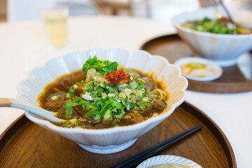 Hot taiwan beef noodle soup on table