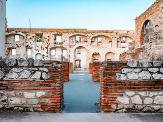 Ancient Roman Triclinium ruins in Split, Croatia, featuring weathered stone and brick architecture...