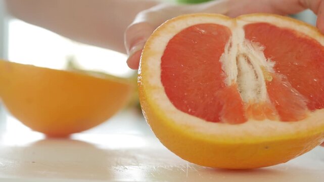 Girl Cutting Oranges Fruits for Breakfast, Child Preparing Healthy Food