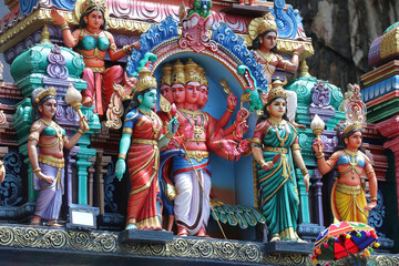 Multheaded Hindu God Kartikeya with Spear and Deities, Detailed Sculpture on Temple Wall in Malaysia, Hinduism Mythology Art