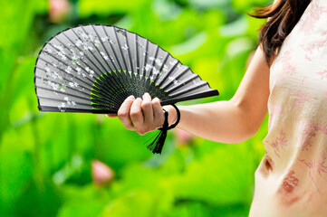 young woman with fan