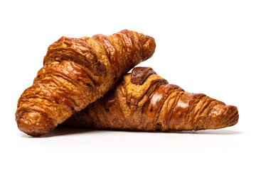 two freshly baked classic delicious fresh organic croissants isolated on white background