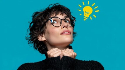 Creative concept of a thoughtful young woman experiencing a moment of inspiration, illustrated by a glowing light bulb, representing innovation, bright ideas and problem-solving