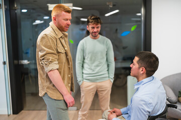 Business team discussing project in a modern coworking office, showcasing diversity and inclusion...