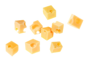 Cheese cubes in air against white background