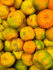 Ripe orange under the light