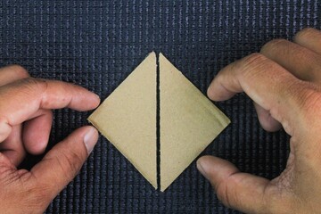 Two combine to form a square. teamwork concept. two elements combining to form a square symbolizes...