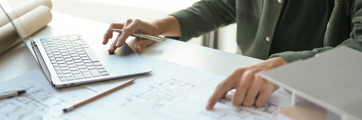 Architecture Man drawing on architectural Creative project business architecture building...