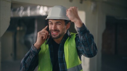 Frustrated Caucasian man arguing call angry builder speak mobile phone in construction architect handyman communicating remote conversation male supervisor quarrel foreman conflict work problem stress