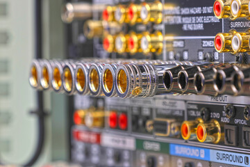 Rear panel of a high-quality AV receiver with multimedia connections for connecting speakers,...