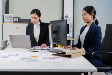 Team businesswoman analyzing financial graphs, calculating company expenses, and planning investments, corporate, accounting, and economic strategy.