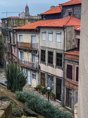 Romantic backstreet, side street or alley in historic old town of Porto Oporto, Portugal with...