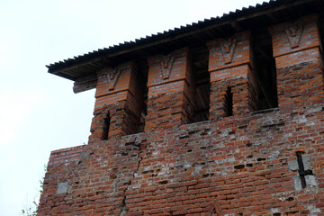 Fototapeta premium part of an old red brick wall