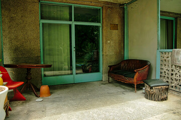 A patio with a couch and a table