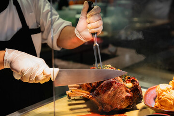 Chef Slicing Prime Rib Roast at Carving Station