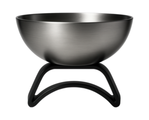 Lightweight titanium bowl on an ergonomic stand designed for a minimalist living area.