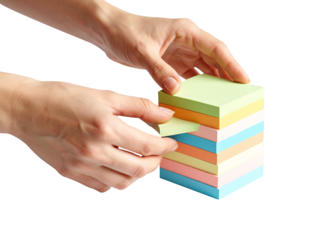 Hands arranging a stack of colorful sticky notes, separating one for use
