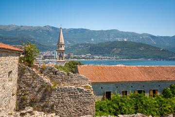 Panoramic view from the rooftop of the Citadel in Budva, Montenegro, overlooking the Old Town with its traditional rooftops and historic buildings