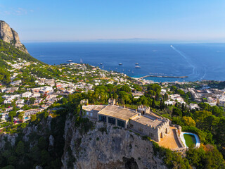 Capri. Amalfi coast. Italy. Drone view. View from above. Buildings and landmarks of Capri. Drone view of Capri. Boats and yachts. The most famous island.