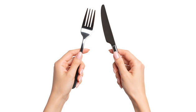 A pair of hands grasping dining cutlery, symbolizing mealtime.