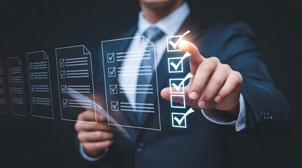 Businessman's hand checking off items on a digital checklist to do list task management
