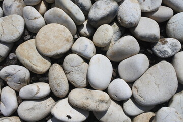 River stones formed by nature are round, smooth and neat, this texture photo is good if used as a...