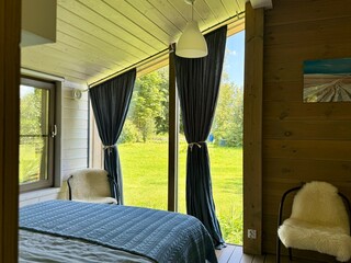 stylish bedroom in a modern style in a country house. High quality photo