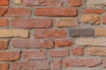 Beautifully textured rustic brick wall showcasing vintage colors and patterns