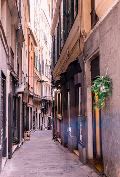 The High Sided Alleyways Of Caruggi ( Old Town ) In Genoa, Italy