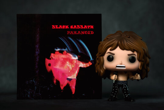 Funko POP vinyl figure of Ozzy Osbourne British singer of the heavy metal group Black Sabbath along with the CD Paranoid. Illustrative editorial of Funko Pop action figure
