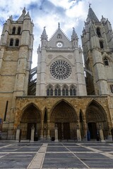 Western facade of Leon Cathedral with rose window and twin towers