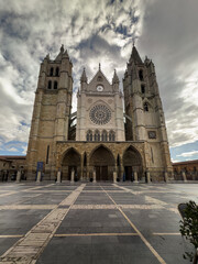Western facade of Leon Cathedral with rose window and twin towers