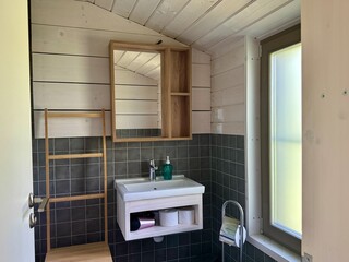 Modern bathroom interior in a country house. High quality photo