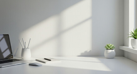 Modern workspace with laptop, plants, and natural light in minimalist style  