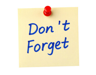 A yellow sticky note pinned with a red pushpin, displaying the handwritten message "Don't Forget" in blue ink.