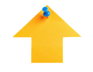 A yellow arrow-shaped note pinned with a blue pushpin.