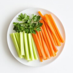 Plate with carrot and celery sticks on white