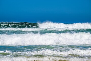 Surfer riding a wave on Contis beach, Saint Julien en Born , Saint-Julien-en-Born, Landes, France,...