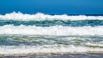Surfer riding a wave on Contis beach, Saint Julien en Born , Saint-Julien-en-Born, Landes, France, Europe