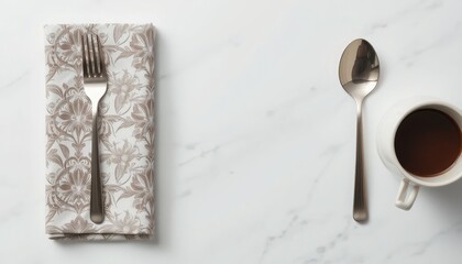 Simple table setting with coffee and utensils on a textured surface