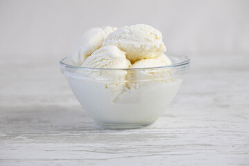 Creamy ice cream in a glass bowl
