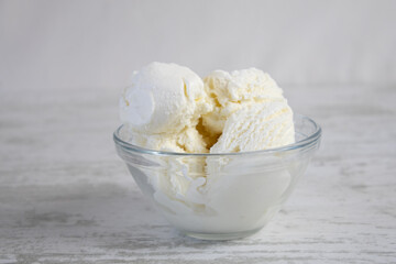Creamy ice cream in a glass bowl