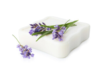 Soap bar and lavender flowers isolated on white