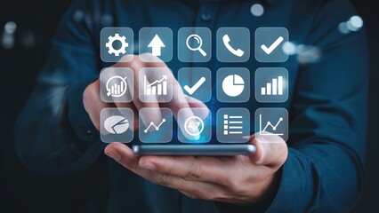 Man interacting with futuristic digital dashboard, accessing business analytics and data visualization on smartphone