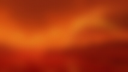 Naklejka premium Photo of a warm gradient of orange and red with a subtle textured effect