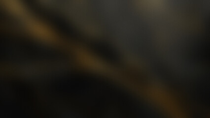 Photo of a dark textured background with a diagonal streak of gold light creating a dramatic and luxurious atmosphere