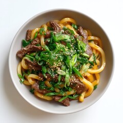 Delicious Stir-Fried Noodles with Tender Beef and Fresh Green Onions Garnished with Sesame Seeds