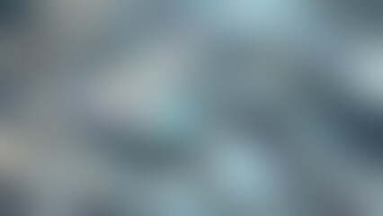Photo of abstract blue and grey textured background with soft light