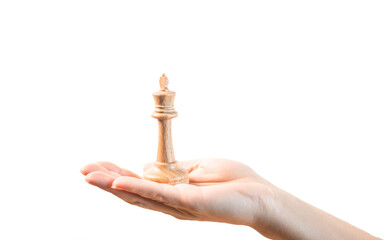 chess piece on a chessboard in female hands on a light background
