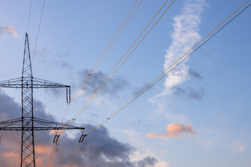Close-up high voltage tower. Power lines. Industrial energy